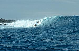Andres, with power, driving off the bottom and down the line at Chicken Hill in the Galapagos Islands.